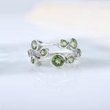 Peridot Orbit Ring